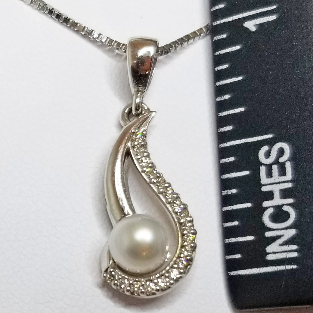 Ready to ship pearl and diamond swirl pendant in 14k white gold