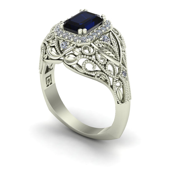 Blue sapphire and diamond emerald cut ring in 14k white gold