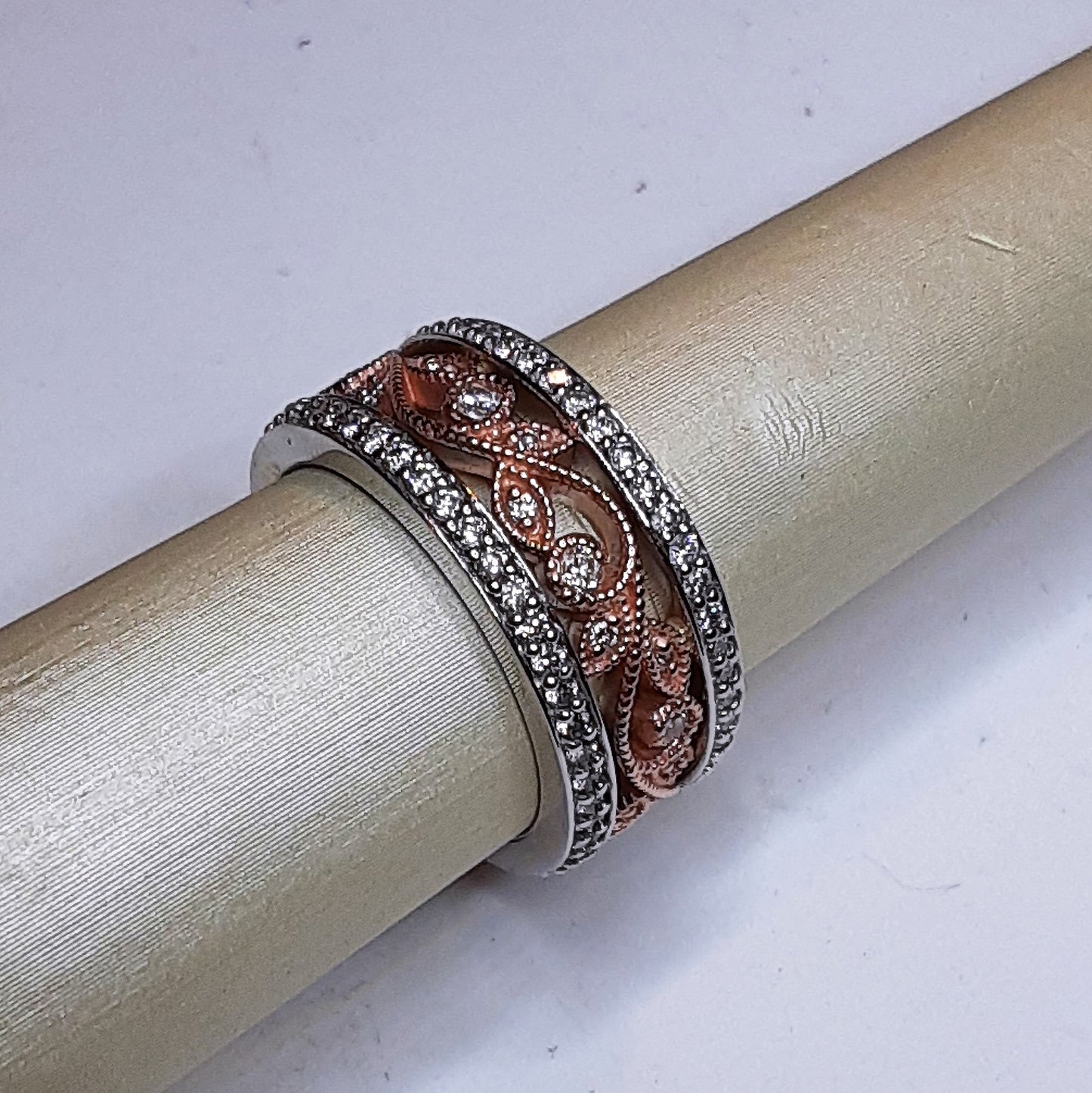 Ready to ship diamond floral wide wedding band in 14k rose and white gold size 5
