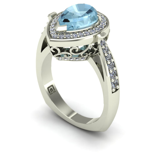 Aquamarine and diamond pear scroll ring in 14k white gold