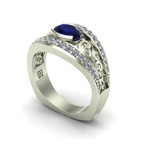 Blue sapphire and diamond ring in 14k white gold