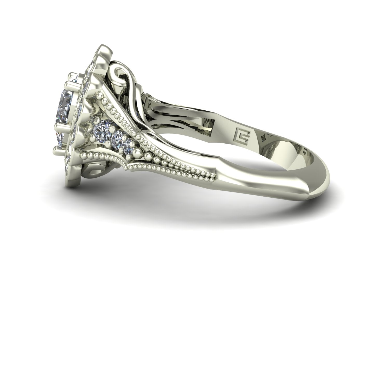 three quarter carat pear cut diamond engagement ring with scallop halo in 18k white gold - Charles Babb Designs - side view