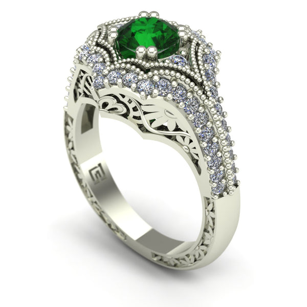 Emerald and diamond ring with floral carving in 14k white gold